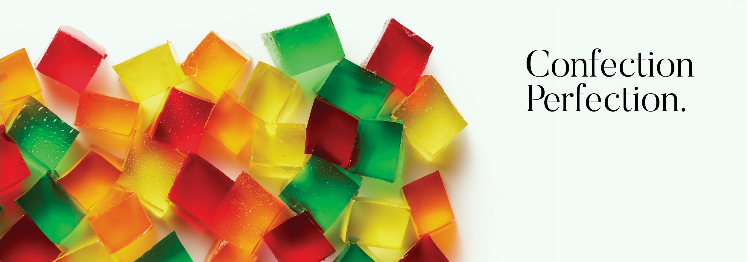 Colorful assorted confections on the left and the phrase 'Confection Perfection.' on the right.